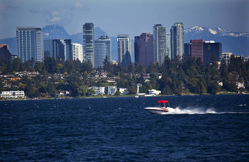 a beautiful view of bellevue skyline from lake washington on a sunny day