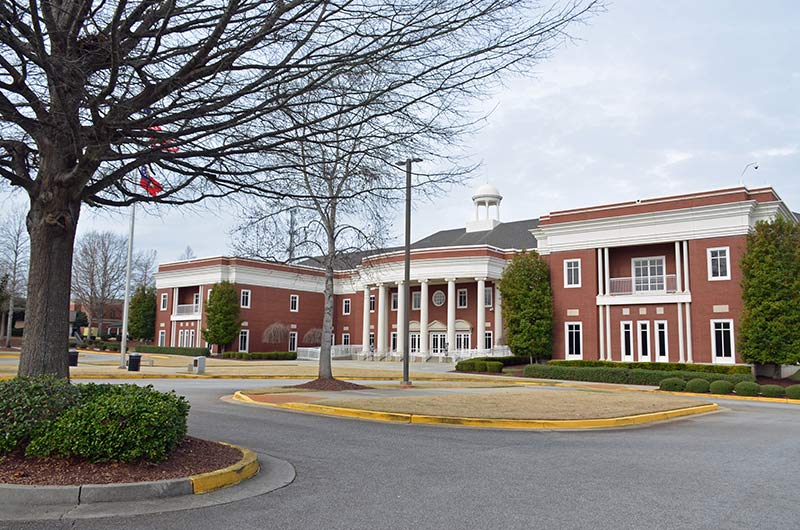 a red building representing a state facility 