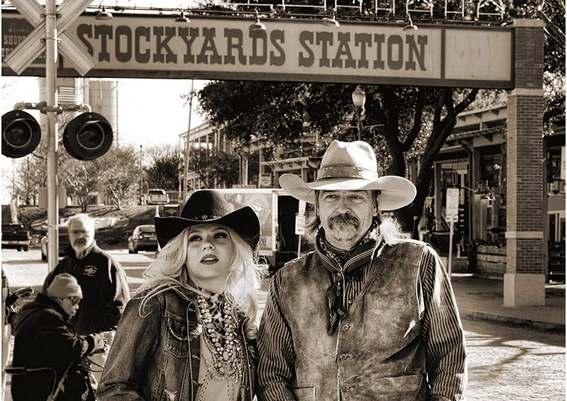 a blonde woman and a man with a beard and mustache in fort worth, texas