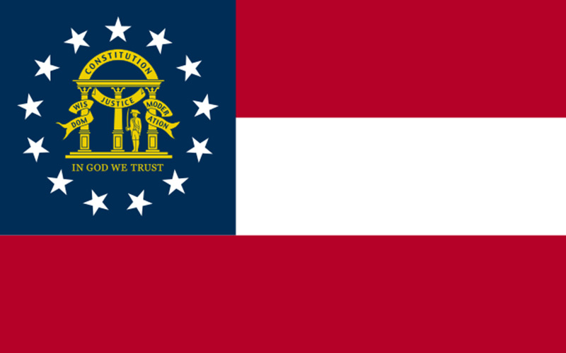 georgia flag in blue white and red with in god we trust motto