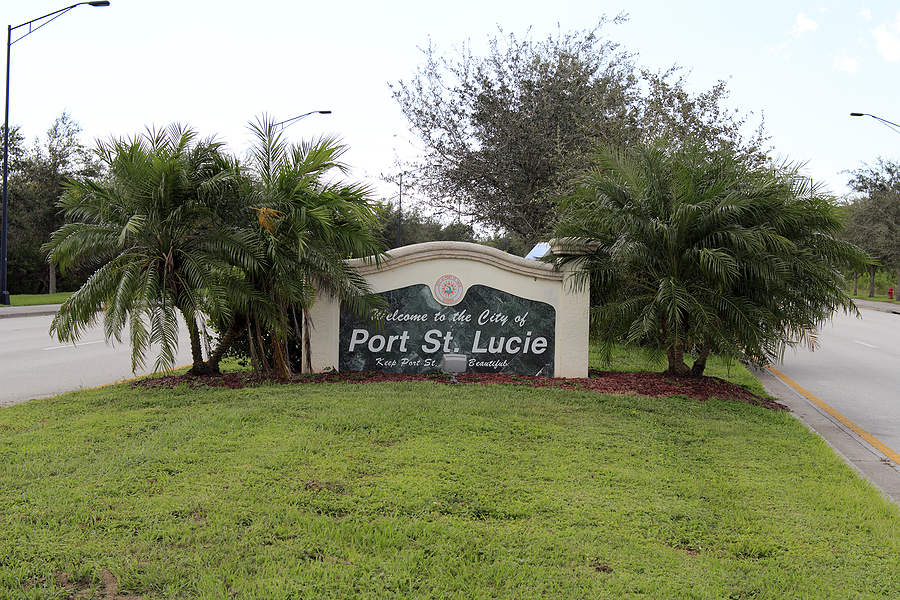 a photo of welcome to the city outdoor sign