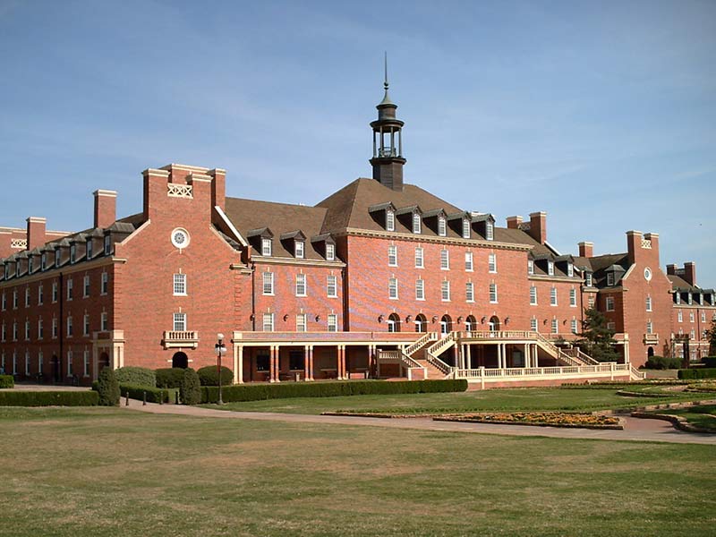 a huge red brick building complex 