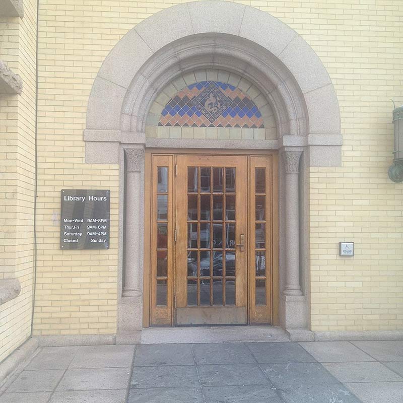 westerly public library featuring a wooden door and working hours 